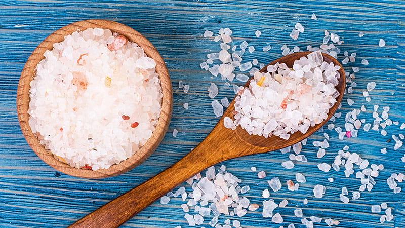 pink salt on blue background